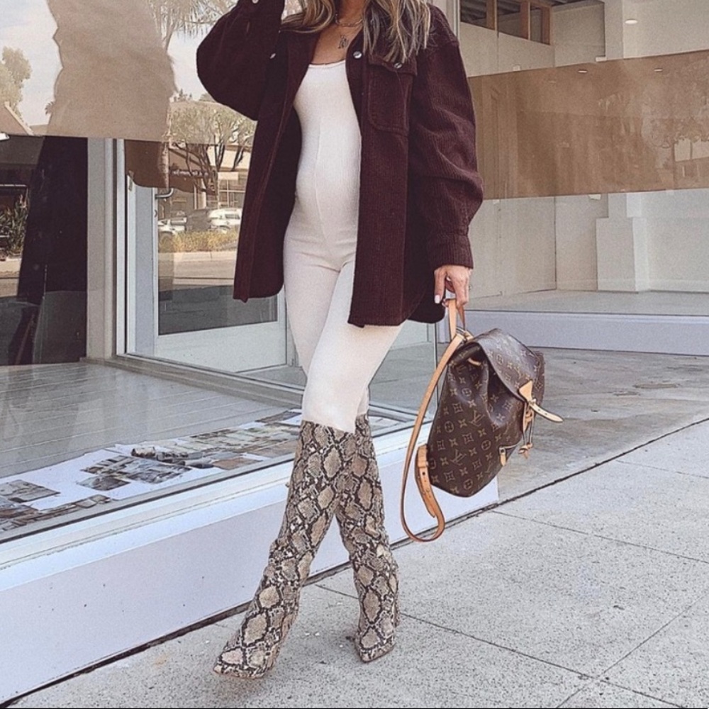 Cream jumpsuit. Slightly see through